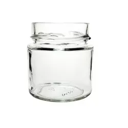 Petit bocal en verre transparent avec bouchon, prêt pour la conservation ou le vrac.